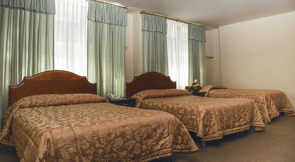 Hotel Podocarpus Loja Cameră foto